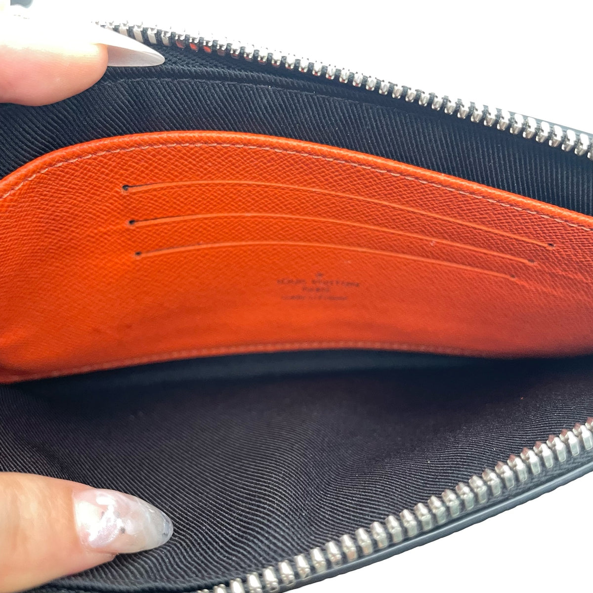 Louis Vuitton Canvas Orange Clutch