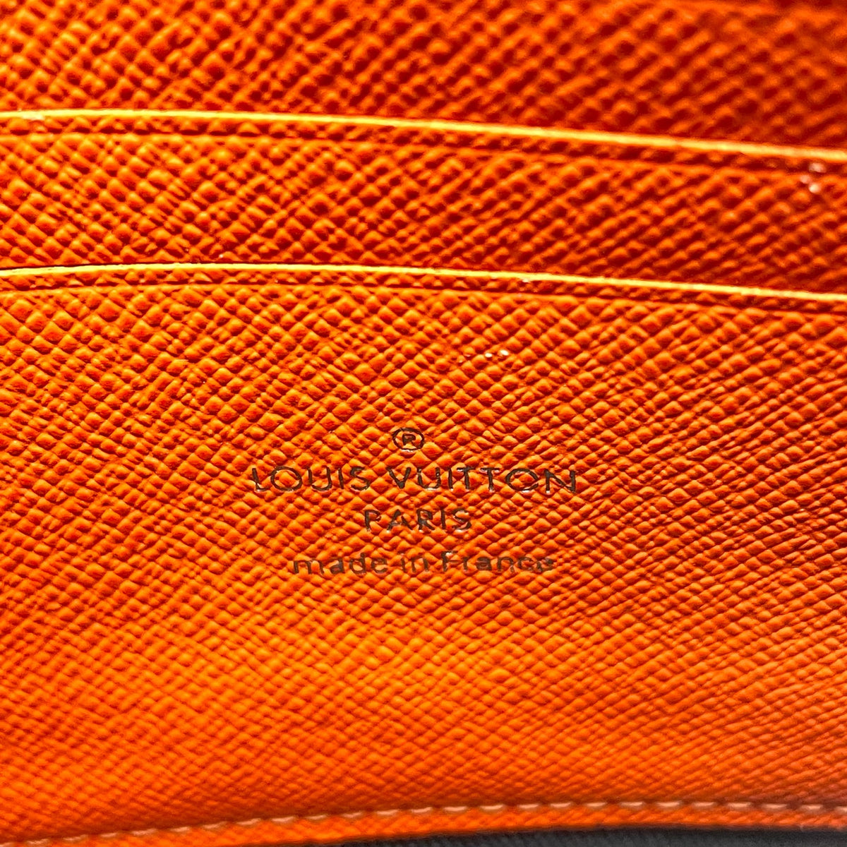 Louis Vuitton Canvas Orange Clutch
