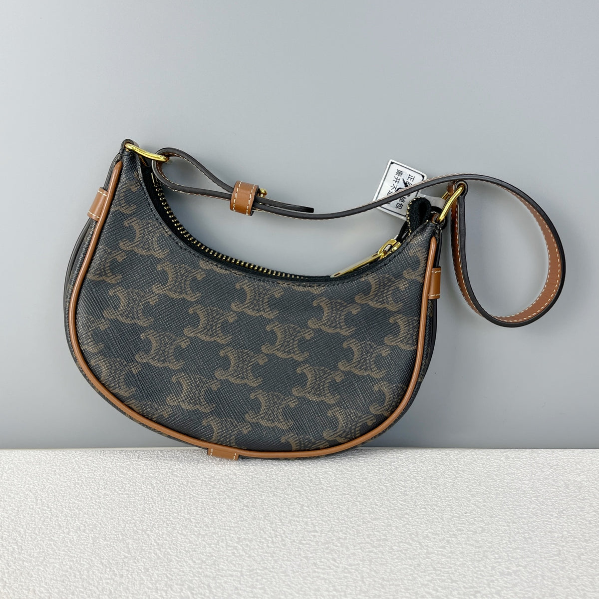 Celine Mini AVA logo-print cowhide handbag Brown 6 x 5 x 2 inches (16 x 12 x 5 centimeters) 10I602DS1.04LU